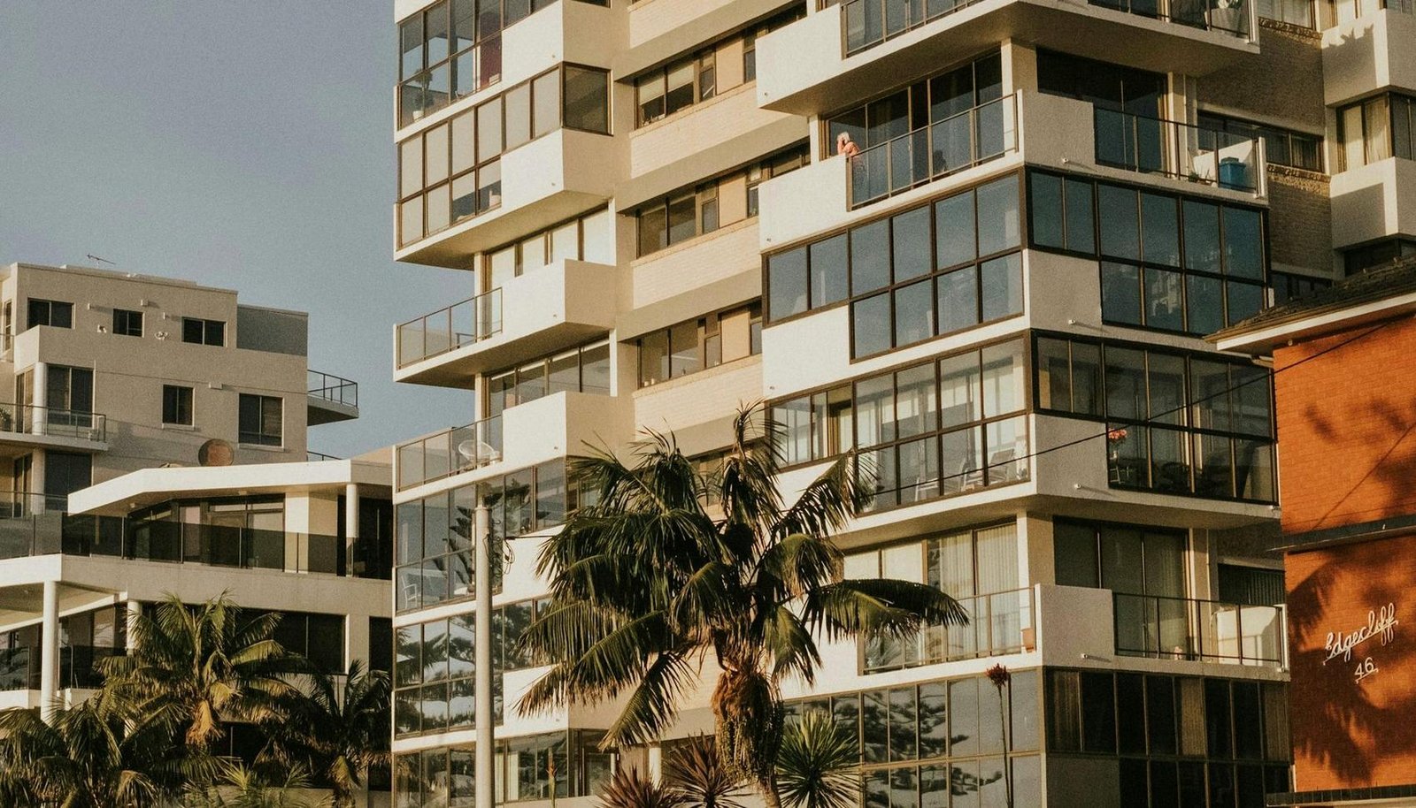 Mid-rise residential buildings in a landscaped gated community